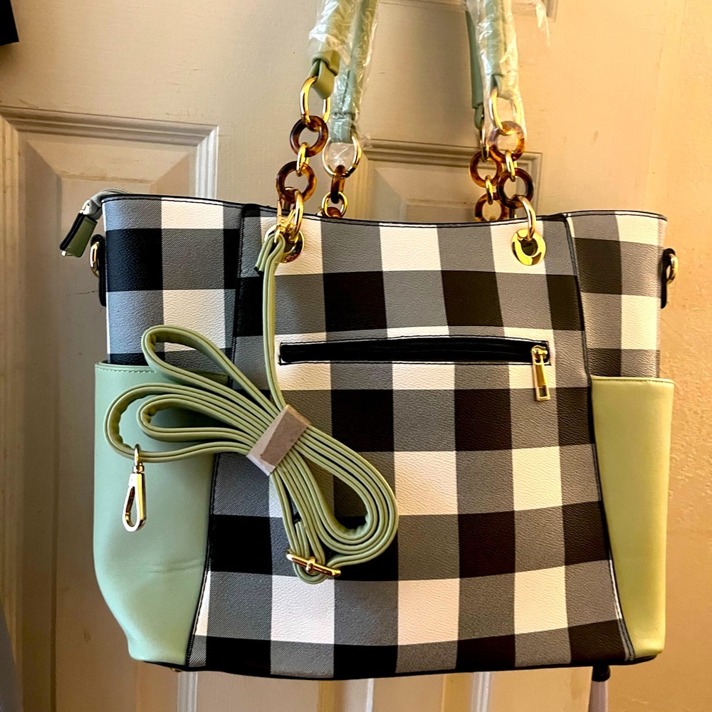 Woman’s tote bag with brown and gold embellishments